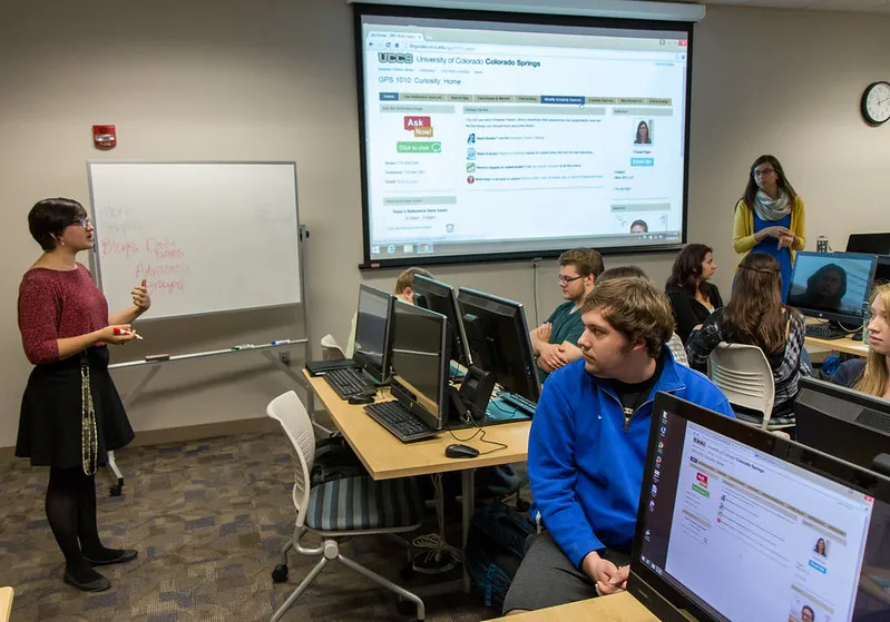 photo of librarians teaching students