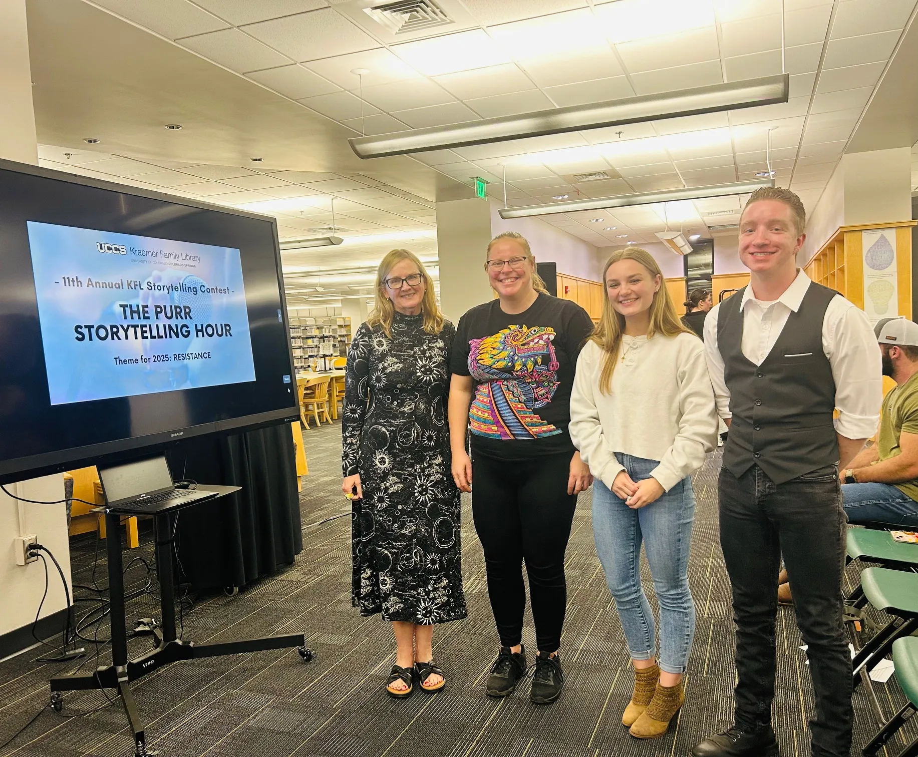 four contestants in the purr storytelling contest posing together