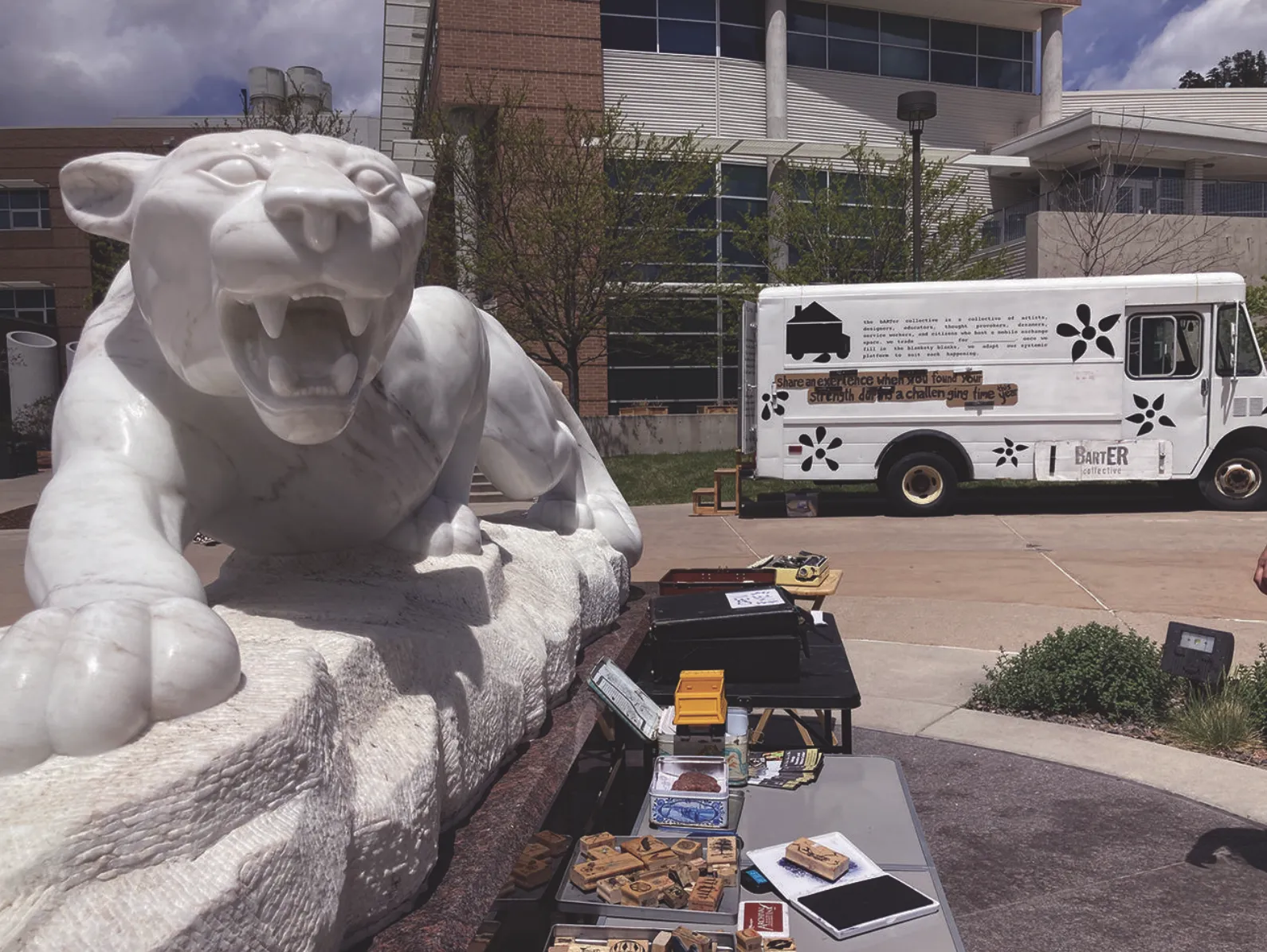 Mountain lion statue and Barter Truck